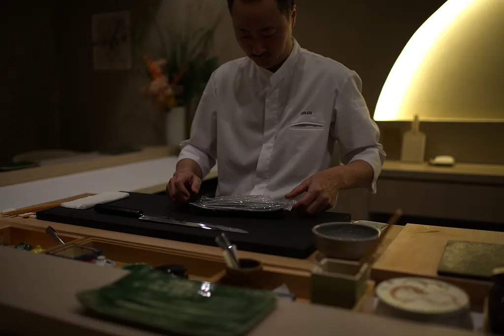 The chef working behind the counter