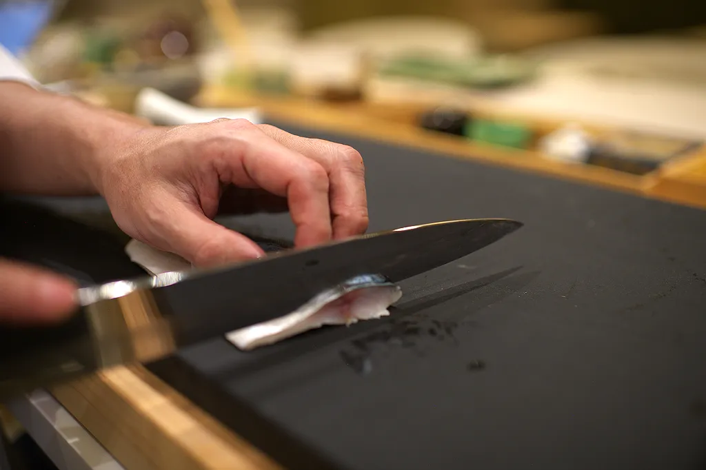 A yanagiba blade on the cutting board